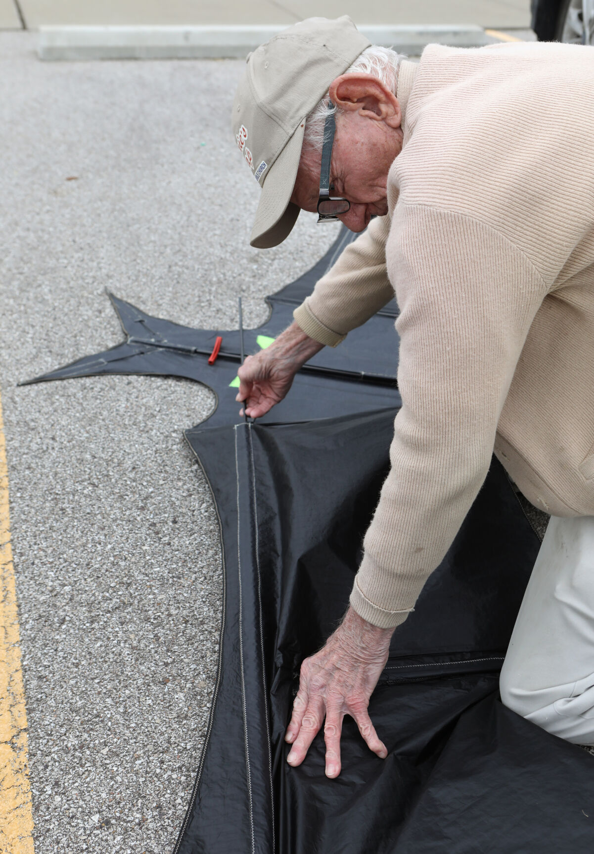 Roy White assembles a bat kite